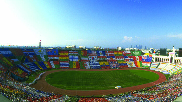 A view of the Coliseum with spectators creating international flags in the crowd