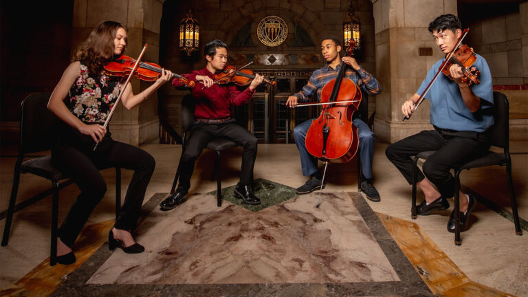 USC Thornton students playing multiple string instruments