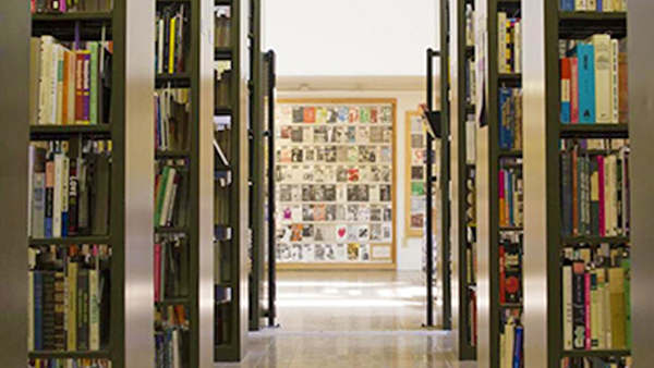 Hallway between shelves in the library archives.