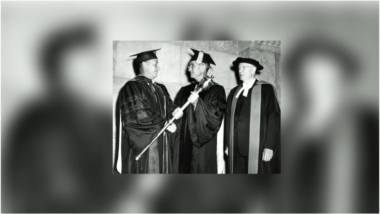 Norman H. Topping receiving the silver mace from USC Board of Trustees chairman Asa V. Call, while renowned Shakespeare scholar Frank Baxter, who designed the mace, looks on
