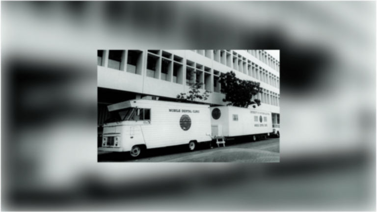 USC's mobile dental clinic trucks parked on the street