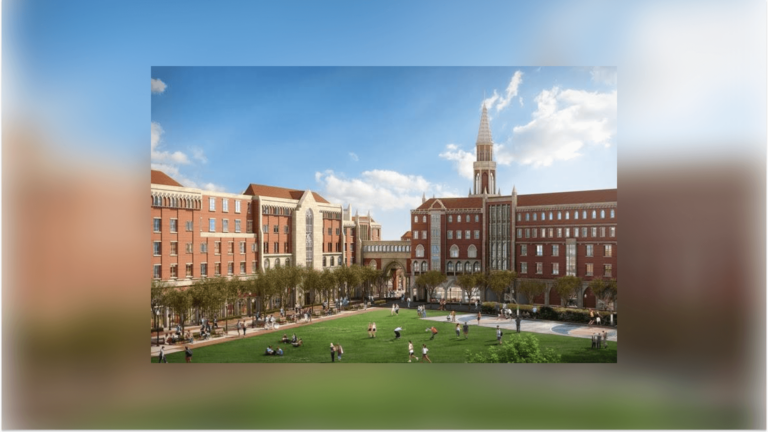 A model of the USC village. In the center is a large green field where people come to hang out. Surrounding the green field are large brick buildings with lots of windows.