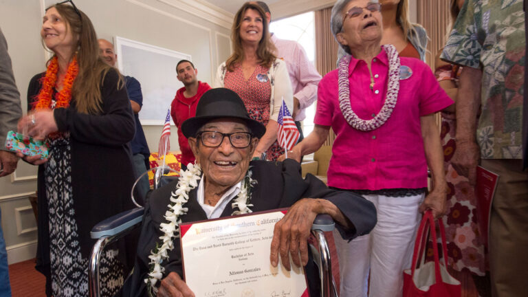 Alfonso Gonzales, USC's oldest graduating Trojan at 96, receives his diploma