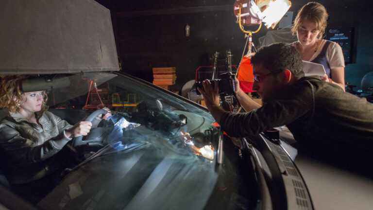 SCA students filming in a studio on campus.