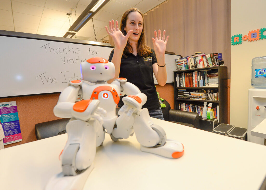 USC Viterbi student with robot