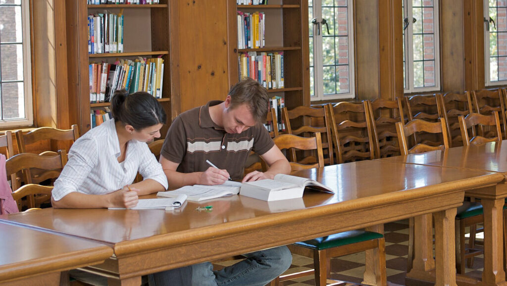 Two students at USC library studying