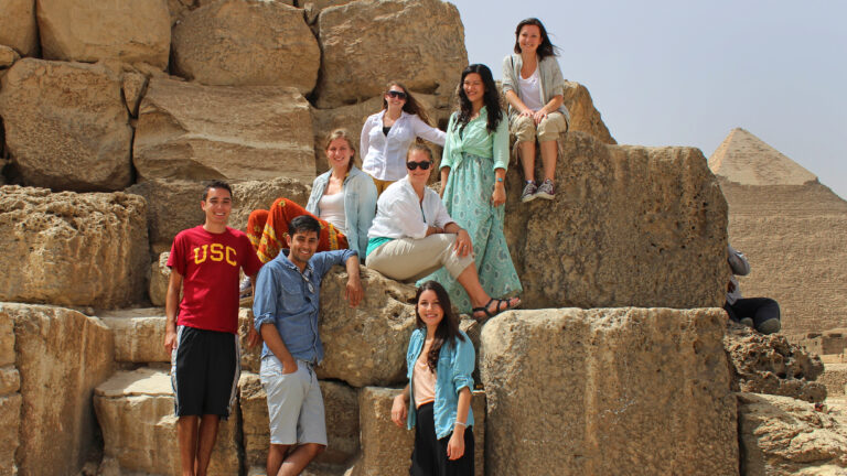 Group of USC students visiting a pyramid in Egypt